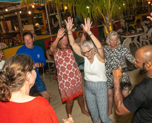 Patrons dancing together at Reggae Beach Lobster Fest